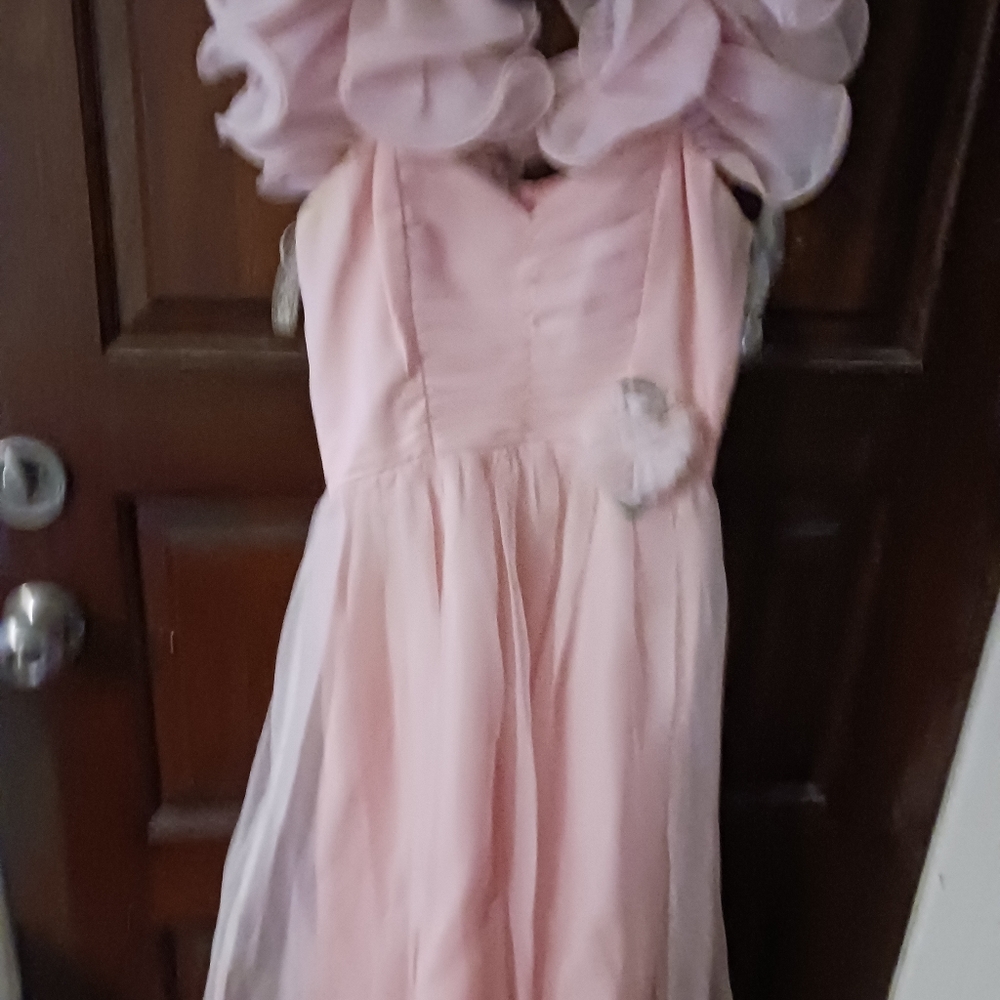 PINK RUFFLE GOWN SIZE 6. SHOULDER RUFFLES MID KNEE LENGTH